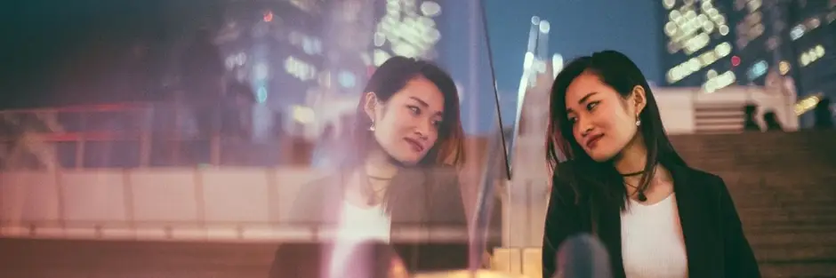 A professional salesperson engaging with a customer in a meeting, building trust and connection to develop a long-term relationship.